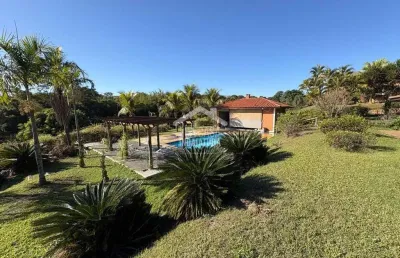 Chácara com 4 dormitório e piscina condomínio lagos de shanadu