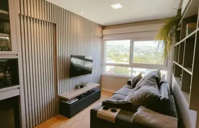 Apartamento com 1 dormitório e 1 vaga de garagem no bairro partenon