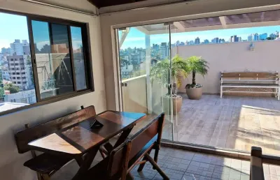 Apartamento cobertura com 02 dormitórios, living 02 ambientes com garagem e baix
