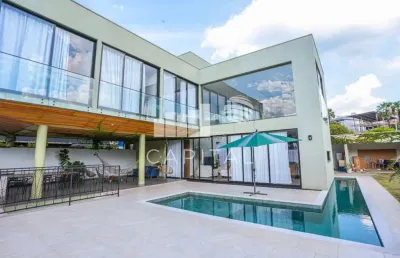 Vendo e alugo casa nova, moderna mobiliada em condomínio de alto padrão em alphaville.