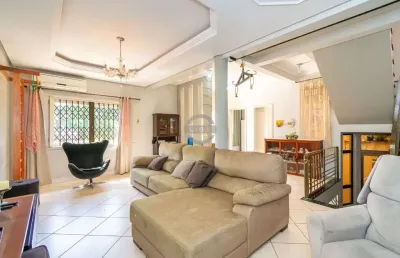 Casa com 5 quartos à venda na rua isidoro tressi, 507, jardim botânico, porto alegre, 379 m2 por r$ 1.615.000