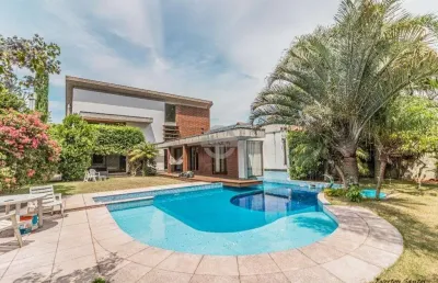 Casa em condomínio fechado com 4 quartos à venda na avenida juca batista, 8000, belém novo, porto alegre por r$ 2.900.000