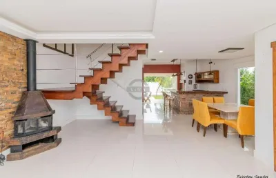 Casa em condomínio fechado com 3 quartos à venda na avenida edgar pires de castro, 540, hípica, porto alegre por r$ 999.000