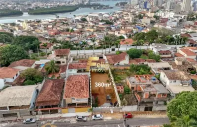 Terreno à venda no bairro são judas tadeu, guarapari/es, próximo ao centro, 100% escriturado, financiável, terraplanado e pronto para construção!
