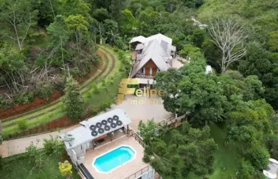 Casa de campo alto padrão em condomínio fechado com portaria 24 horas.
