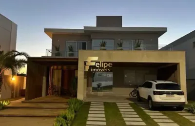 Belíssima e harmoniosa casa duplex localizada em condomínio de luxo em serra/es!