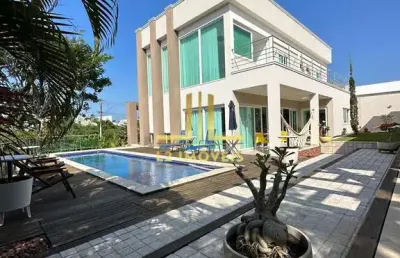 Casa luxuosa - 4 suítes - nascente total - alphaville litoral norte 2