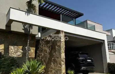 Casa de condomínio à venda, 4 quartos, 3 suítes, 2 vagas, aclimação - uberlândia/mg