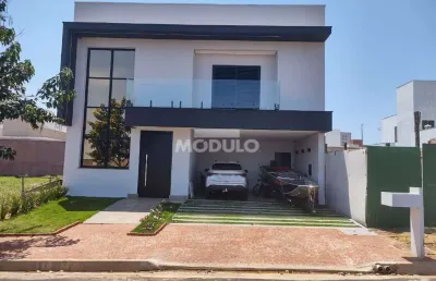 Casa residencial à venda, 4 quartos, 4 suítes, 2 vagas, grand ville - uberlândia/mg