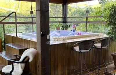 Casa à venda com 5 suítes no bairro nova capivari em campos do jordão/sp