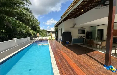 Linda casa em alphaville litoral norte 1 com 4 suítes mobiliada reformado