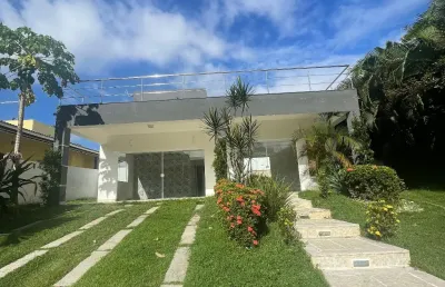 Casa a venda em alphaville litoral norte 1 com 4 suites piscina e area gourmet