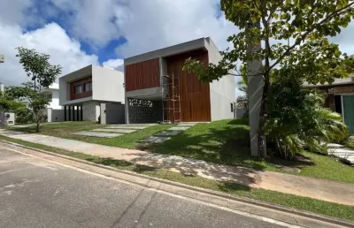 Casa a venda em alphaville litoral norte 2 com 4 suites
