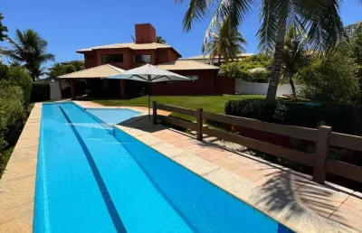 Casa a venda no cond praia dos lagos com 4 suites mobiliada e pé na areia