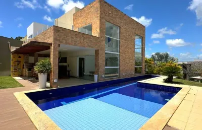 Casa a venda em alphaville litoral 2 com 3 quartos piscina área gourmet