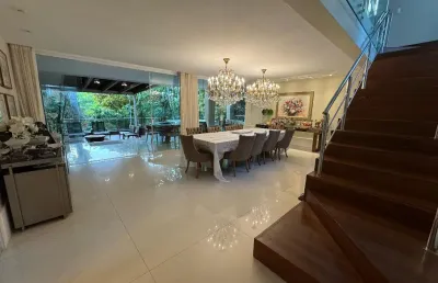 Casa a venda em alphaville 1 com 4 suites reformada com energia solar no estrela do mar