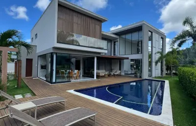 Casa a venda em alphaville litoral norte 1 com 5 suites mobiliada alto luxo