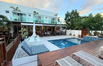 Casa a venda em busca vida com 4 suites piscina área gourmet em condominio fechadp