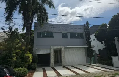 Casa a venda em alphaville 1 com 4 suites piscina e área gourmet