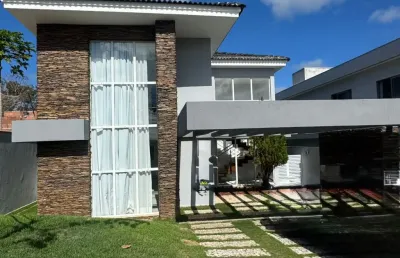Casa a venda em alphaville litoral norte 3 com 4 suites piscina e área gourmet