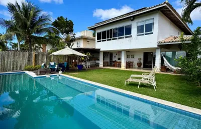 Casa a venda no golf quatro rodas em itapuã com 4 suítes piscina e área gourmet