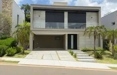 Imperdível: casa em condomínio de luxo em alphaville dom pedro, campinas-sp, com 4 suítes, 403m² e 4 vagas de garagem!