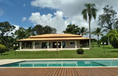 Sítio na beira da represa 78.000m2 barracão com 100 mts garagem para 10 carros 2 açude de peixe pier 120m2 casa de caseiro casa principal piscina aque