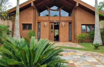 Casa em condomínio fechado com 5 quartos à venda na Avenida Albino dos Santos Gandares, 30, Jardim Acapulco, Guarujá