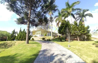 Casa à venda no bairro chácaras alpina com 5 suítes.