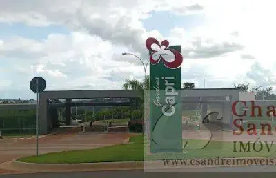 Lote em condomínio fechado para venda em senador canedo, jardins capri