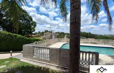 Chácara a venda em condominio com piscina, churrasqueira, pomar, horta, escritório, casa principal e casa de caseiro