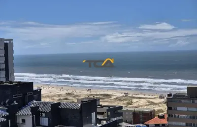 Apartamento 02 dormitórios novo finamente mobiliado a poucos metros do mar em to