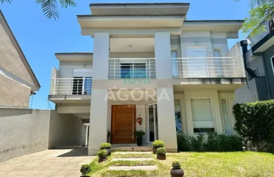 Excelente sobrado de 4(quatro) dormitórios com 3(suítes). localizado no bairro bela vista em canoas