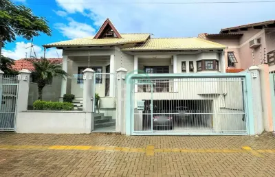 Casa térrea de 312,42 m² com 3 (três) dormitórios sendo 3 (três) suítes no bairro bela vista