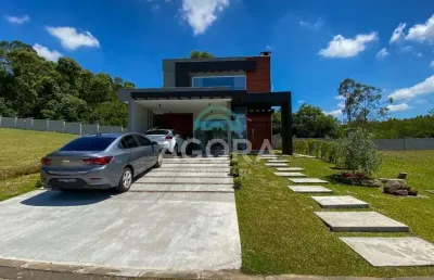 Sobrado mobiliado em condomínio fechado medindo 213,81 m² em nova santa rita