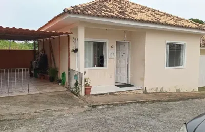 Casa dois quartos sendo uma suíte em  condomínio  outeiro.
