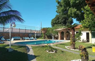 Casa quatro quartos sendo duas suítes 200 metros da lagoa