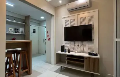 Apartamento mobiliado com vista mar, condomínio pe na areia