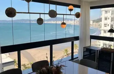 Apartamento alto padrão vista mar com 3 suítes e 2 vagas de garagem em itapema