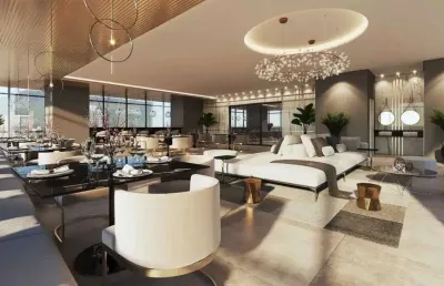 Apartamento em construção com 4 suítes, 3 vagas de garagem na meia praia em itapema