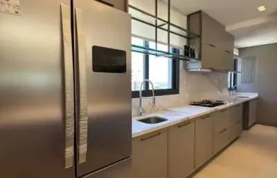 Apartamento com 3 suítes e 3 vagas de garagem na praia brava em itajaí