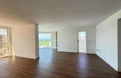Apartamento novo com 3 suítes e 2 vagas de garagem na meia praia em itapema