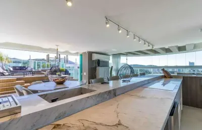 Cobertura com 4 dormitórios sendo 3 suítes e 4 vagas de garagem na praia brava - itajaí