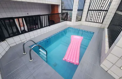 Cobertura espetacular no bairro da ocian - com piscina e churrasqueira.