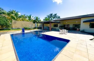Casa em condomínio fechado com 4 quartos à venda no Abrantes, Camaçari 