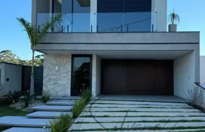 Casa á venda no condominio bella citta com 4 súites sendo