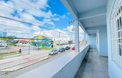 Imóvel comercial com duas frentes e terreno amplo no centro de navegantes