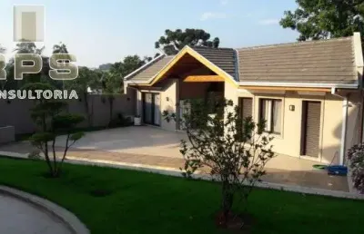 Casa dos sonhos à venda no condomínio palavra da vida, em estilo americano, semi-mobiliada, 402m² construção, 4 quartos, 5 banheiros, 3 vagas