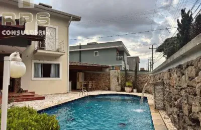 Casa para locação e venda na vila petrópolis em atibaia, 3 quartos sendo 1 suíte, escritório, área de lazer com piscina, espaço gourmet e jardim!