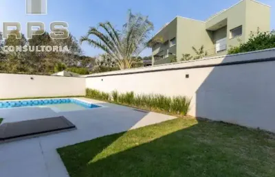 Casa a venda no figueira garden com 3 suítes, sendo 1 com closet, piscina com praia e hidro, cozinha em conceito aberto e fino acabamento.
